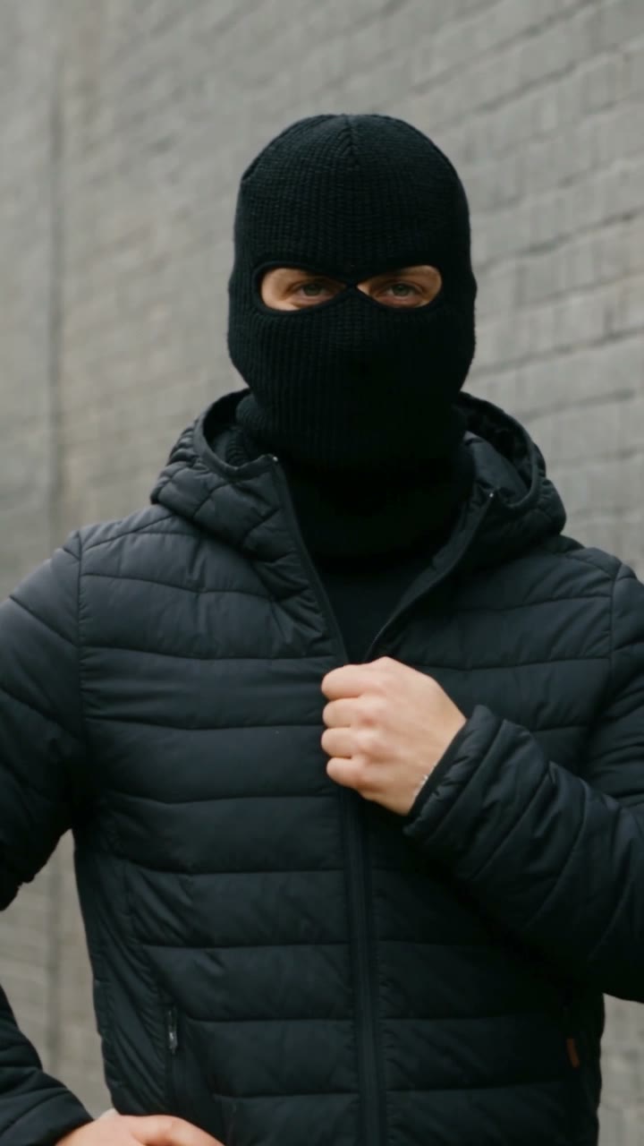 Mandem in Disguise AI result preview — Your group photo holds, a camera flash fires, and everyone is a masked guy in a black balaclava and puffer…